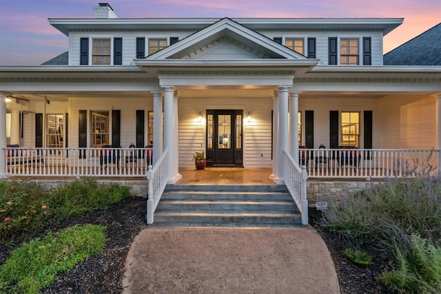 view of front of home featuring covered porch