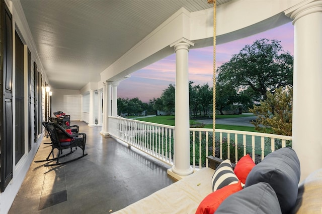 sunroom / solarium with ornate columns