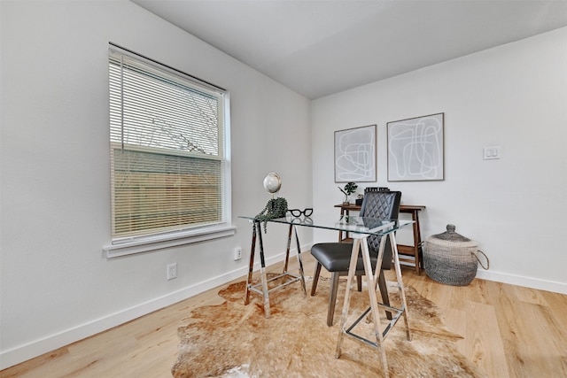 office area featuring plenty of natural light and light hardwood / wood-style floors