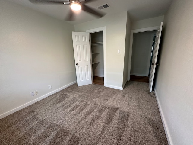 unfurnished bedroom with a closet, ceiling fan, and carpet floors