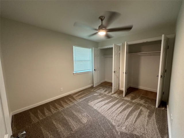 unfurnished bedroom with ceiling fan and carpet