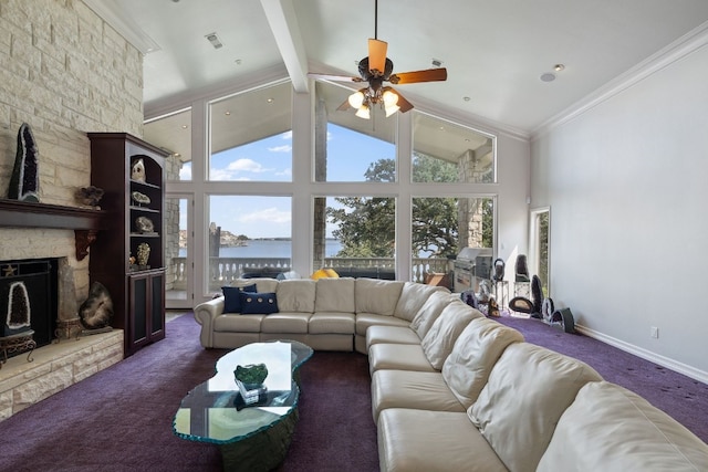 living room featuring ceiling fan, high vaulted ceiling, carpet flooring, beam ceiling, and a stone fireplace