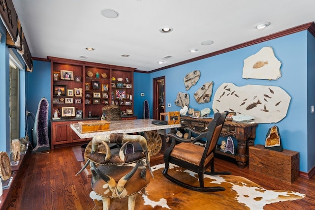 office area with ornamental molding and dark hardwood / wood-style flooring