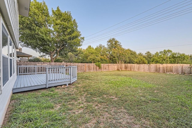 view of yard with a deck