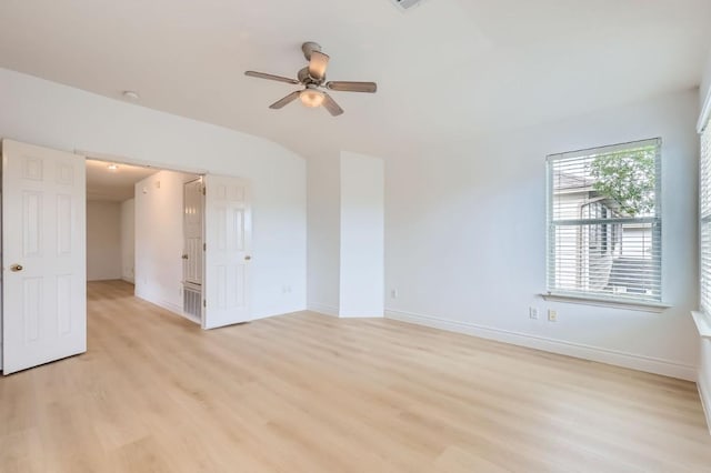 empty room featuring ceiling fan and light wood-type flooring