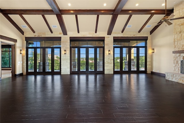 interior space featuring dark hardwood / wood-style flooring, high vaulted ceiling, french doors, and ceiling fan