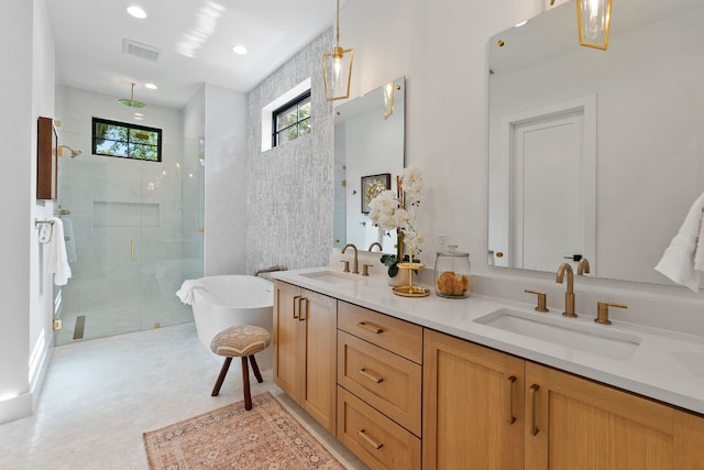 bathroom with independent shower and bath and vanity