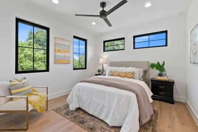 bedroom featuring ceiling fan and light wood-type flooring