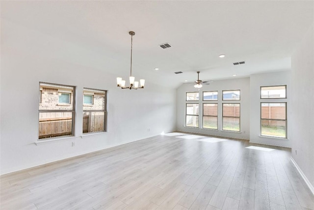 247 Du Bois Ln, Kyle, TX 78640 - empty room with recessed lighting, light wood-type flooring, visible vents, and ceiling fan with notable chandelier