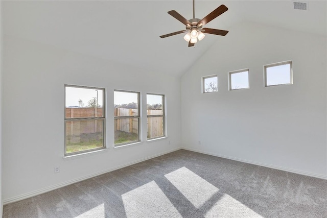 247 Du Bois Ln, Kyle, TX 78640 - empty room with visible vents, baseboards, carpet flooring, high vaulted ceiling, and a ceiling fan