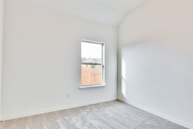 247 Du Bois Ln, Kyle, TX 78640 - carpeted spare room featuring baseboards and lofted ceiling