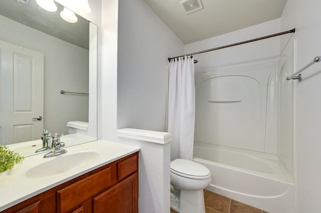 full bathroom featuring shower / tub combo with curtain, vanity, tile patterned flooring, and toilet