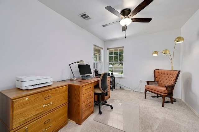 office featuring ceiling fan and light colored carpet