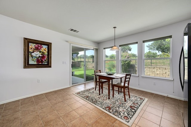 dining room with light tile patterned floors