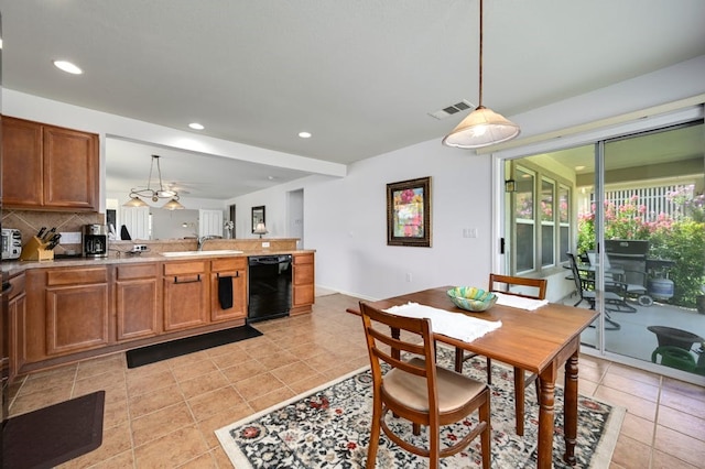 tiled dining room with sink