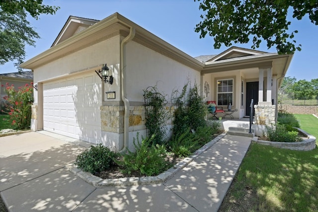 single story home with a garage and a front lawn