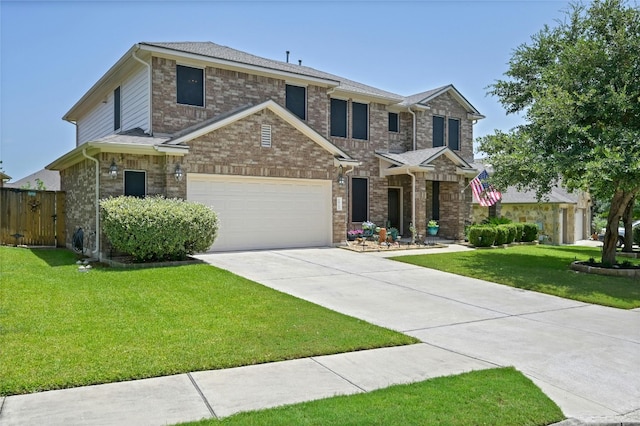 view of front of home featuring a front yard and a garage