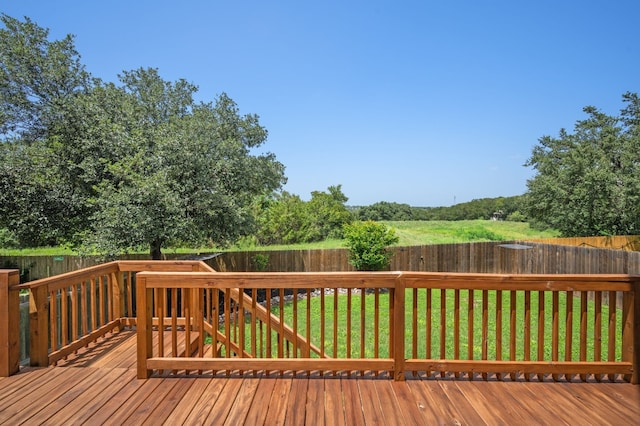 wooden deck with a yard