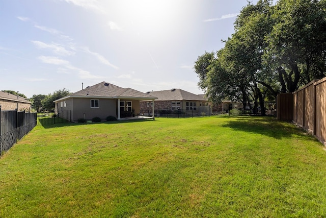 view of yard with a patio area