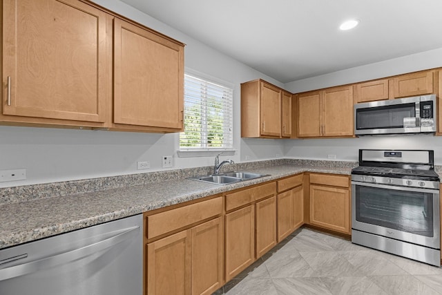 kitchen with stainless steel appliances and sink