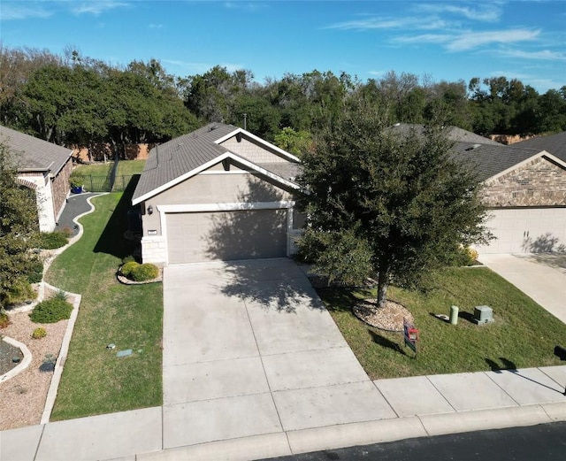 ranch-style house with a front lawn and a garage