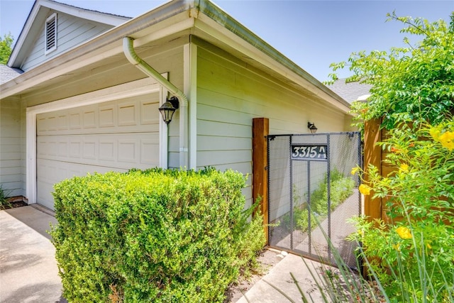 view of home's exterior with a garage