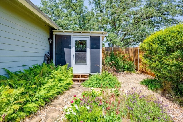 view of outdoor structure with fence