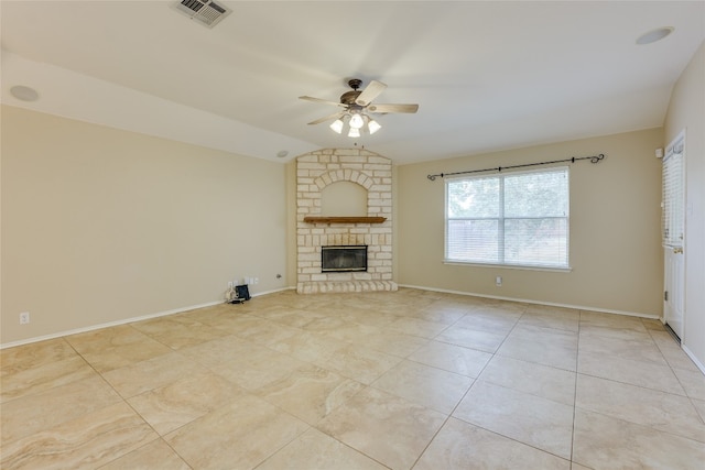 unfurnished living room with a fireplace, ceiling fan, and lofted ceiling