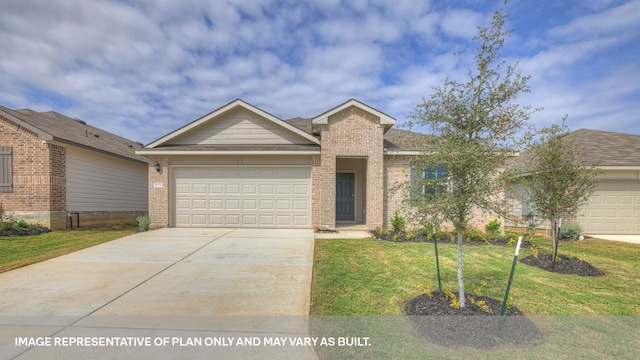 view of front of home featuring a garage and a front lawn