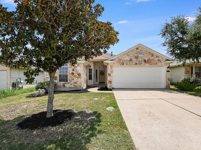 view of front facade with a garage and a front lawn