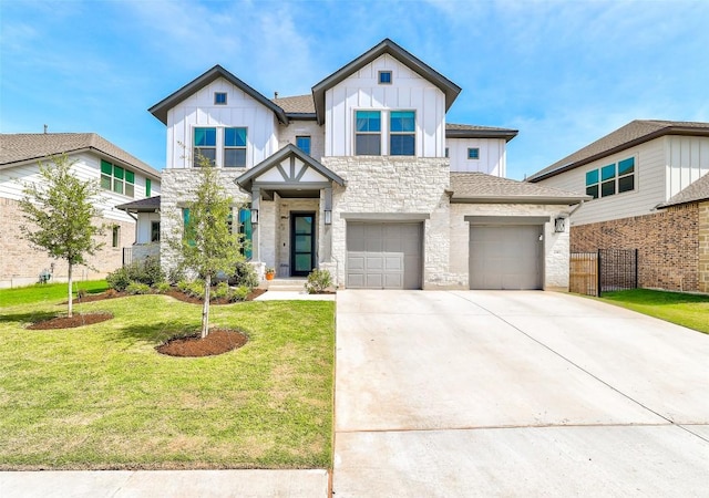 view of front of house featuring a garage and a front lawn