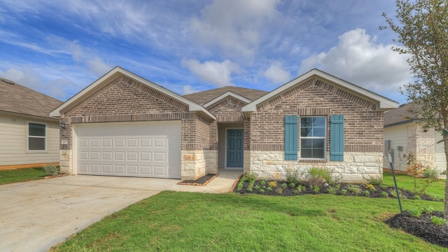 view of front of home with a front lawn and a garage