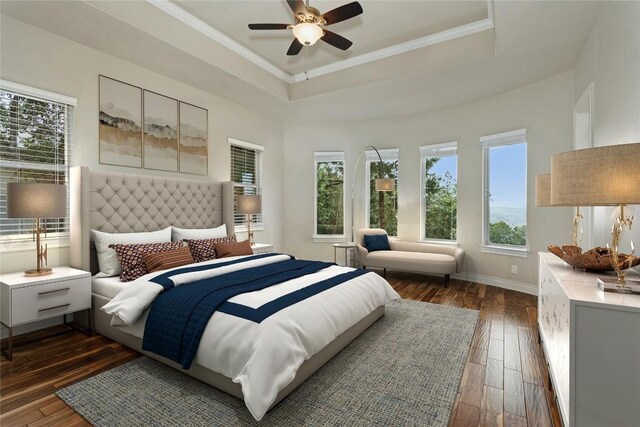 bedroom with ceiling fan, a raised ceiling, dark hardwood / wood-style flooring, and crown molding