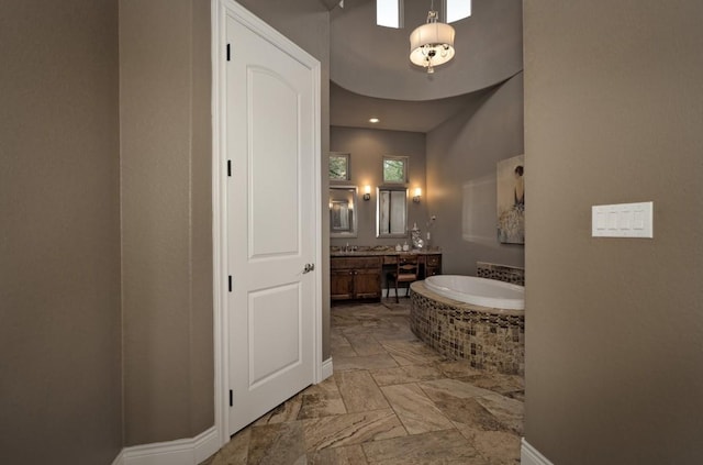 7610 Ramble Rdg, San Antonio, TX 78266 - bathroom with vanity and a garden tub