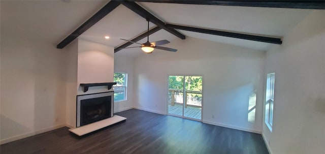 unfurnished living room featuring beamed ceiling, dark hardwood / wood-style floors, and ceiling fan