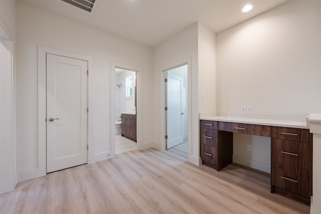 bathroom featuring vanity and wood-type flooring