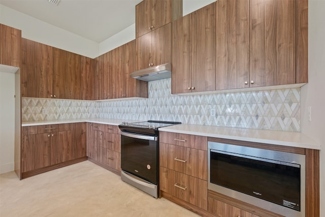 kitchen featuring backsplash and stainless steel appliances