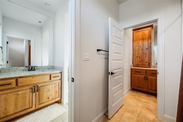 bathroom featuring vanity and tile patterned floors