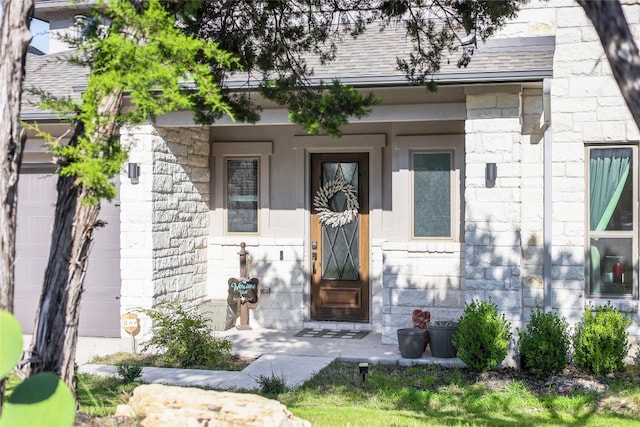 entrance to property featuring a garage