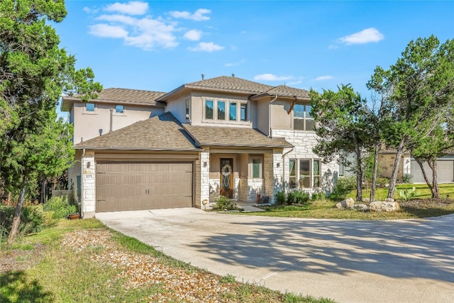 view of front of property with a garage