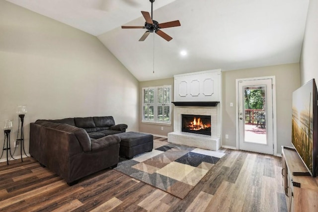 living room featuring high vaulted ceiling, dark wood-type flooring, and ceiling fan