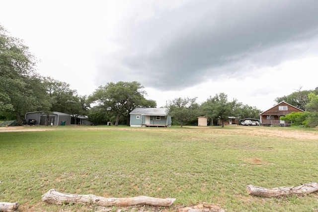 view of yard with a detached carport