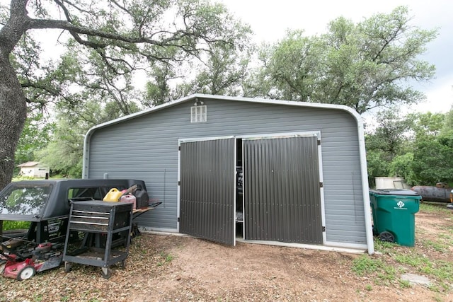 view of outbuilding with an outbuilding