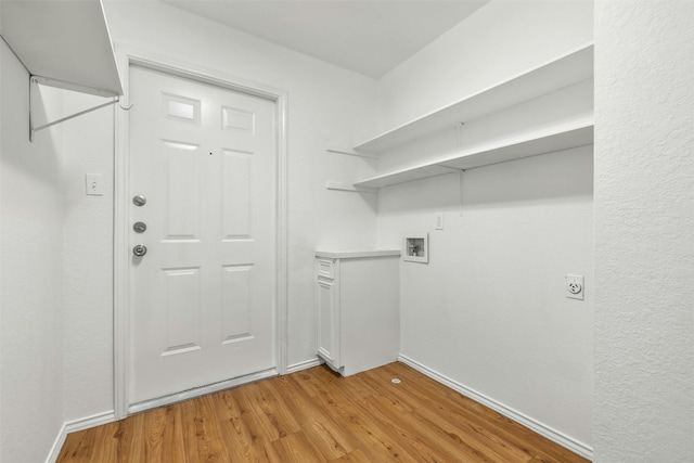 laundry area with electric dryer hookup, light wood-type flooring, and hookup for a washing machine