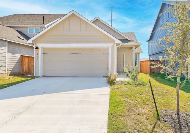 view of front facade with a front lawn and a garage