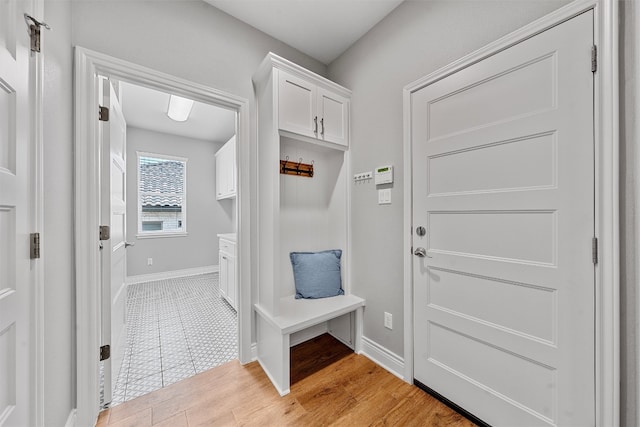 mudroom featuring light tile patterned floors