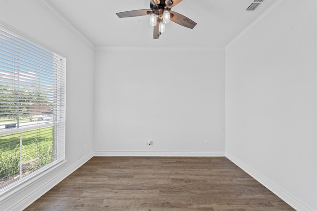 unfurnished room with dark wood-type flooring, crown molding, and ceiling fan