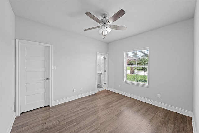 unfurnished room with hardwood / wood-style floors and ceiling fan