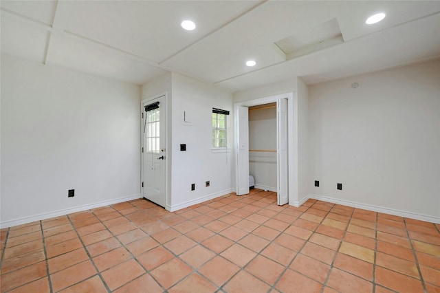 unfurnished bedroom featuring light tile patterned flooring