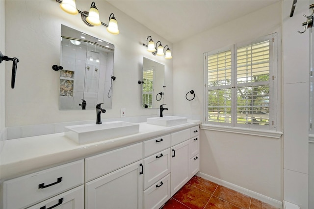 bathroom featuring tile patterned floors and double vanity